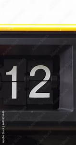 4K footage vertical video front view CU Time-lapse, Flip clock tells the time to flip the sign from number 1 to number 49. Stock Video