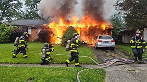 Loveland couple, dog escape from house fire