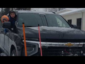 Chevy Suburban Plowing Snow