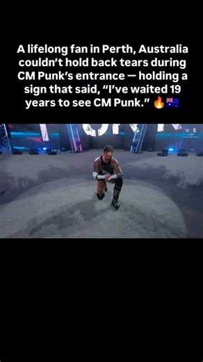 During CM Punk’s entrance in Perth, Australia — a fan broke down in tears, holding a heartfelt sign that read, “I’ve waited 19 years to see CM Punk.” #cmpunk #wweraw #wwe #fan #perth #australia | The Kickout Zone