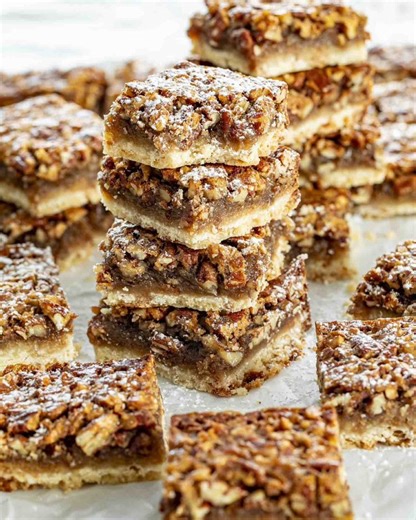 These Pecan Pie Bars are sweet, crunchy, gooey, loaded with pecans, an easy shortbread crust and perfect for a crowd! | JoCooks