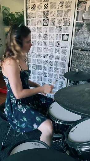Young Woman Drumming to Intricate Line Art Background