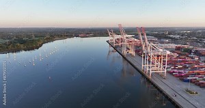 Discover captivating visuals of Southampton Container Port, showcasing bustling activity, impressive cranes, and vibrant shipping containers in this renowned maritime hub.