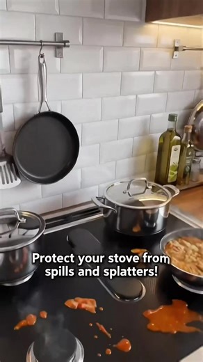 Protect your stove from grease and spills with this **non-stick gas stove cover** 🔥 Keep your cooktop clean and cut down cleaning time. #kitchenhack #stovecover #kitchengadgets #cleanhome #homeessentials