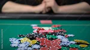 Female poker player betting all casino chips, believe in success, risky strategy