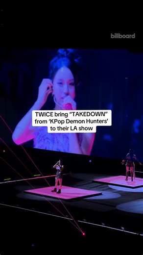 JEONGYEON, JIHYO and CHAEYOUNG from TWICE perform “TAKEDOWN” from the ‘KPop Demon Hunters’ soundtrack at the Kia Forum in LA | Billboard