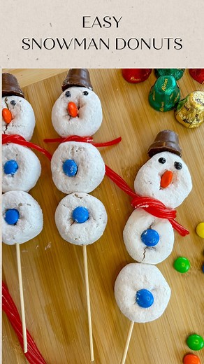Super easy snowman donuts!!!! ⛄️ The perfect snack for class parties or holiday get togethers! You can also add pretzel sticks for the arms! What you need: Small powdered donuts Kabob sticks Reese’s bells (or mini cups) M&Ms Twizzlers pull and peel Black writing icing for the eyes *add pretzel sticks for the arms! #christmas #holiday #christmasrecipes #christmasdessert #cookiedough #christmastreats #holidaydesserts #christmasparty #easyrecipes #follow #instagood #insta #sweettreats #dessert #chr