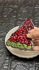 Pomegranate Christmas Tree #pomegranate #chocolate #chocolatebark Chocolate bark ideas, Healthy chocolate treats, Pomegranate and chocolate desserts, Pumpkin seed benefits, Festive chocolate bark, Gourmet chocolate bark, Superfood chocolate bark, Easy chocolate bark recipe, Pomegranate chocolate combinations, Pumpkin seed chocolate bark, Holiday dessert ideas, Antioxidant-rich snacks, Homemade chocolate bark ideas | Recipes By Farida