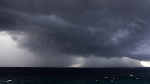 Download Light shower over the ocean for free