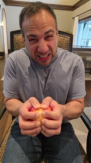 Break open apple with hand