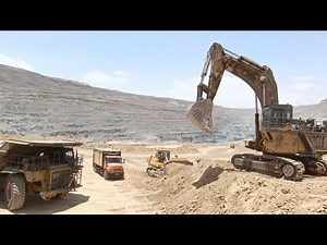 Komatsu Excavator Builds Iron-Ore Platform with Bulldozer + BelAZ Dump Truck Loading