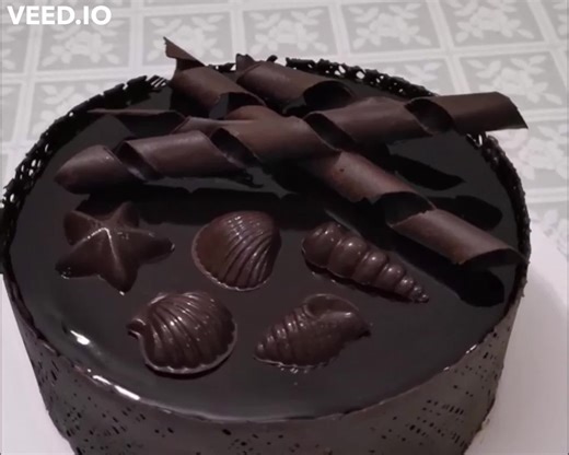 16K views · 174 reactions | Chocolate ice cream cake with chocolate mirror glaze, chocolate shells and decorations ...... can you see the mirror effect 殺 | nadiyaskitchen.com | Facebook
