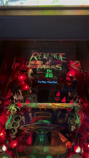 Putting the playfield glass back in Revenge from Mars #pinball machine. #mildlyinteresting