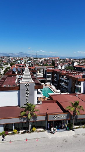 Where elegance meets the warm Mediterranean breeze… Amour Hotel’s stunning outdoor spaces and poolside charm captured from above. Your perfect getaway starts here. ☀️💙 #antalya #manavgat #side #SideAmourHotel #AmourHotelAndSpa #AmourHotel #poolside #kesfetteyiz #theweeknd #virall #fyp | Side Amour Hotel & Spa