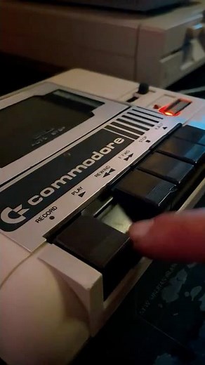 Loading games from a cassette in the 80s.