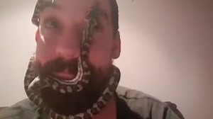 Watch: True love is an intense face-hug from your pet python