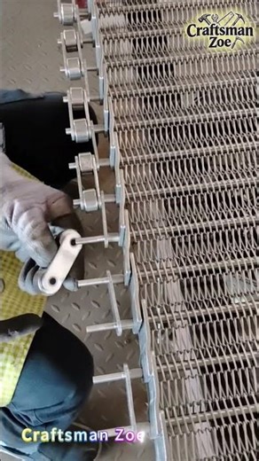 The workers are assembling a 304 food grade stainless steel conveyor belt