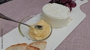 cheese ricotta with honey on the table delicious soft cheese serving fresh made cheese factory restaurant
