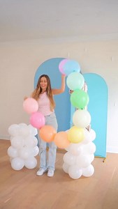 Balloon hack for beginners! I couldn’t believe how fast and easy it was to make this balloon arch! 🤯 🎈 The best part is, this doesn’t require you to spend all day inflating hundreds of balloons! Connect your 12 inch rainbow balloons using glue dots or linking balloons! Then make it stand upright like an arch by propping each color up with a 4-piece cluster of white mini balloons. #DIY #balloons #tutorial #hack #trythis #hacks #lifehacks #partyplanning #partyideas #tipsandtricks | Cher Can Do I