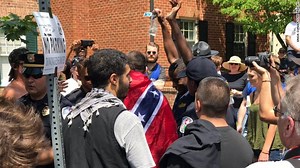 About 50 KKK members were protesting a Confederate statue being taken down in Charlottesville, Va. They were confronted by nearly 1,000 shouting protesters and had to be police escorted to their demonstration spot http://cnn.it/2uZ6l2K | CNN International
