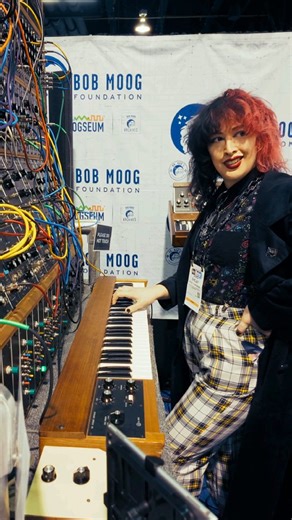 KYROS on Instagram: "What song is it? Wrong answers only. 😁 Another clip from the @bobmoogfoundation booth at #namm2026 - @hereisshelby was getting familiar with the massive Keith Emerson Moog modular synth, and decided to take us way back into the archives for some classic pre-KYROS tunes off of Synesthesia. We've got various flavours and models of @moogsynthesizers all over our albums, but this opportunity was quite a special one for Shelby, especially following @lisabelladonna 's kill