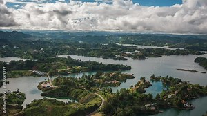 Zoom in timelapse view of dramatic skies over Guatape Reservoir near Medellin, Antioquia Department, Colombia.