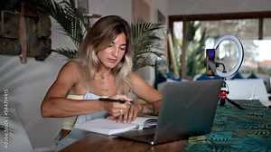 Girl learn english remote. Woman study online education school. Hard student computer macbook training. Distant exam test prepare. Person work laptop. Young adult blonde home remote research session.