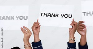 Group of people join together and hold separate thank you words for a sign of appreciation to something or someone on white background, panning technic shoot.