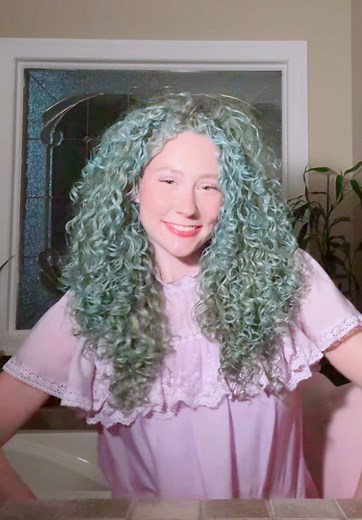 Teal Mermaid Curls: Unique Hair Color Transformation