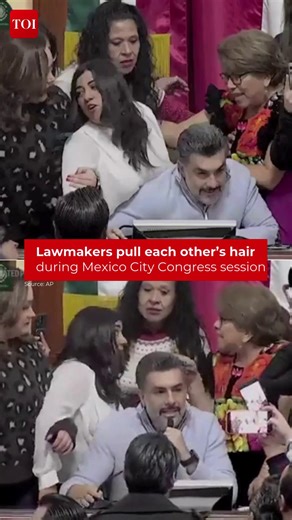 Video from the chamber showed #legislators shoving, yelling and pulling each other’s hair on the podium at the front of the #chamber. The dispute broke out during discussion of a proposal to eliminate the city’s transparency agency and replace it with a new oversight body. #MexicoCity #PoliticalDispute #Government #MexicoCityCongress | The Times of India