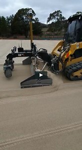 Levelling the sub base with a GPS Grader on a Positrack which ensures the base is level within 5mm accuracy
