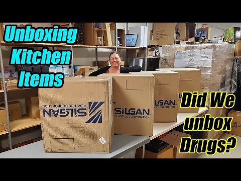 Unboxing so many kitchen items and then we found a weird package!