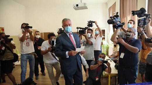 Montenegro’s president and opposition leader vote in closely fought election