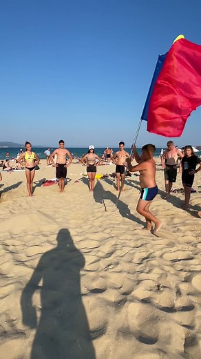 Beach Day Fun with Friends and Colorful Flags
