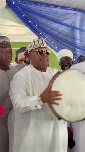 Governor Ademola Adeleke shows off his drumming skills during NASFAT Ramadan lecture | Intel Region