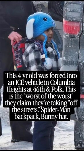 Southern Punk on Instagram: "Porch family, take a breath and really look at what is in front of us. Not the headline. Not the politics. A child. A four-year-old baby in a blue bunny hat, bundled against the cold, wearing a Spider-Man backpack so big it nearly covers his whole back. He is standing in the snow, next to an ICE vehicle, while an adult hand rests on his shoulder. That is the moment someone decided was acceptable. That is the moment a government agency chose to create. And it tells th