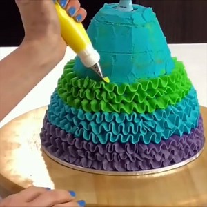 1.1M views · 4K reactions | These doll cakes prove they don't have to be pink and frilly to be gorgeous! | Cake Style | Facebook