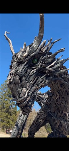 Located in Lavarone, in the Italian region of Trentino, Drago Vaia Regeneration is a monumental wooden dragon sculpture created by artist Marco Martalar. Measuring approximately 16 metres long and 7 metres tall, it was built using roots and wood from trees that fell during Storm Vaia in 2018, which devastated forests across the Italian Alps. The original dragon was destroyed by an arson attack in August 2023. Rather than letting the sculpture disappear forever, Martalar decided to create a new, 