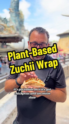 Plant-Based Zuchii Wrap: Grilled Zucchini, Smoky Chickpea-Onion Slaw, Creamy Garlic-Tahini Sauce, and Fresh Cilantro wrapped in Pita Bread from Ronto Roasters #disney #disneyparks #disneyworld
