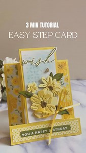 Easy Step Card with Delightful Wishes Bundle Let’s make a fun fold card, the Easy Step Card, using the Delightful Wishes Bundle! I’m sure this delightful card will make someone smile! Products used: -Delightful Wishes Bundle -Floral Delight 12” x 12” Designer Series Paper -Daffodil Delight 1/8” (3.2 MM) Satin Ribbon -Tiny Bee Trinkets -Early Espresso Writing Marker -Old Olive Blends Marker -VersaMark Ink Pad -White Heat Embossing Powder Color Combo: Daffodil Delight, Lemon Lolly, Old Olive, Peca