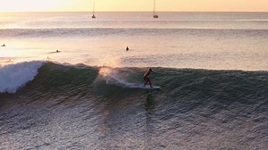 Download Bali, Indonesia - July 18th 2025. Surfing on