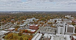 Atlanta Aerial v740 wide angle panoramic pan view capturing downtown cityscape of Decatur with beautiful autumn foliage trees during fall season - Shot with Mavic 3 Cine - November 2021