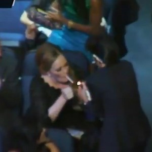 Lady Gaga gets up from her seat next to Tony Bennett to light Adele's cigarette at the 2011 VMAs | Lady Gaga Daily