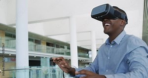 Businessman using VR in a modern office