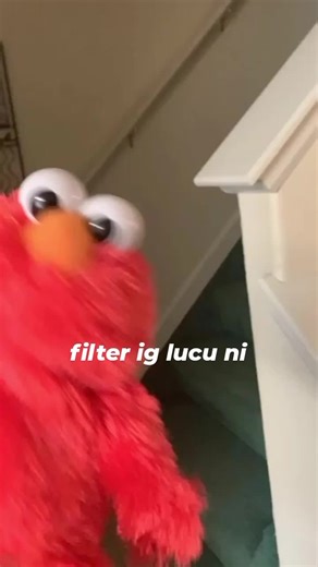 Red Furry Puppet Dancing with Heart Graphics