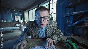 Close up face emotional guy removes glasses use computer typing on keyboard look on screen. Geek. Active work. Office or apartment Stock Video