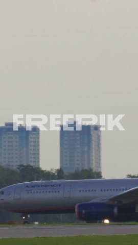 Images of airplanes at an airport | Premium Stock Video Footage