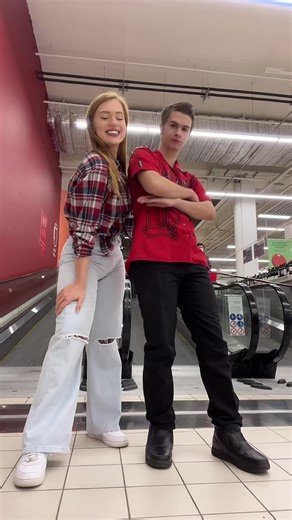 Coordinated Dance Routine on Shopping Mall Escalator