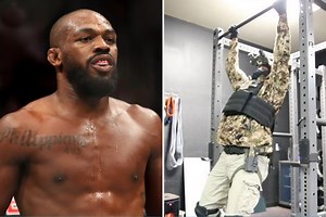 UFC star Jon Jones bizarrely trains in full camo gear with machine gun