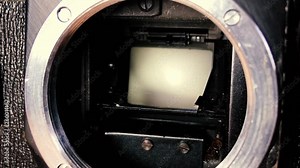 triggering the camera mirror shutter. old slr camera